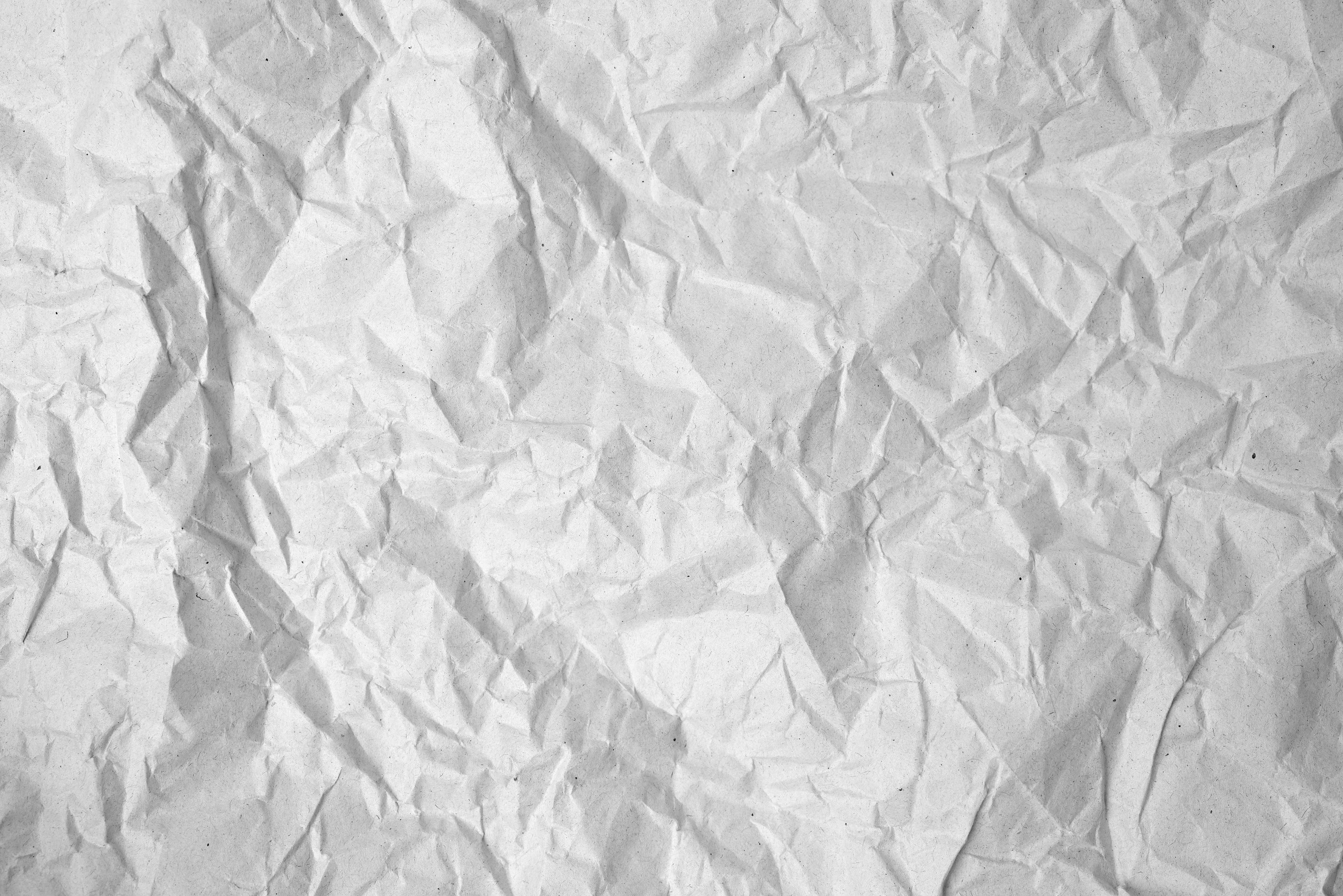 Crumpled Blank Sheet of Gray Wrapping Kraft Paper
